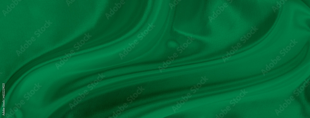 Obraz premium Black green satin dark fabric texture luxurious shiny that is abstract silk cloth background with patterns soft waves blur beautiful.
