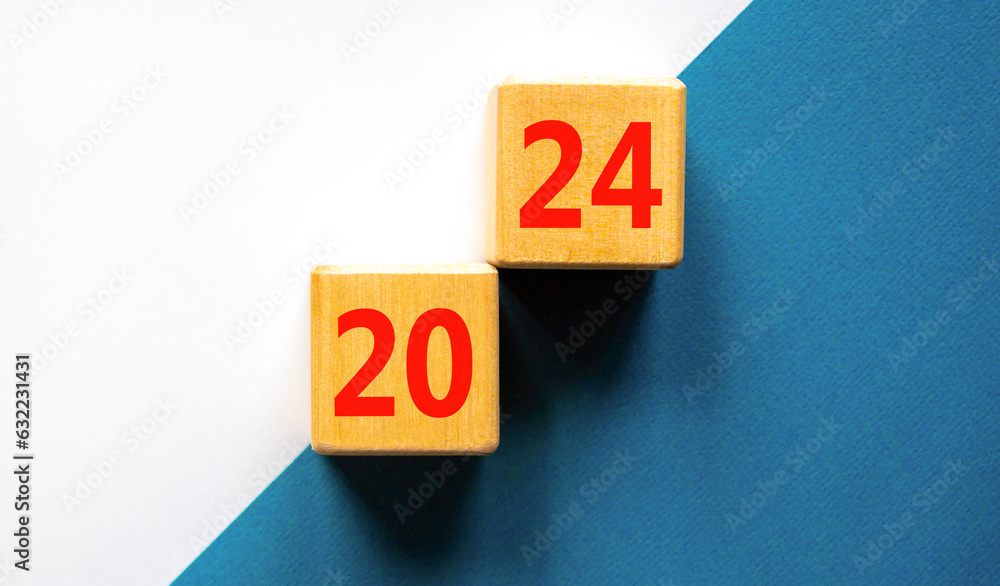 2024 happy new year symbol. Wooden cubes with number 2024. Beautiful white and blue background, copy space. Business and 2024 happy new year concept. 2024 happy new year symbol. Wooden cubes with number 2024. Beautiful white and blue background, copy space. Business and 2024 happy new year concept.