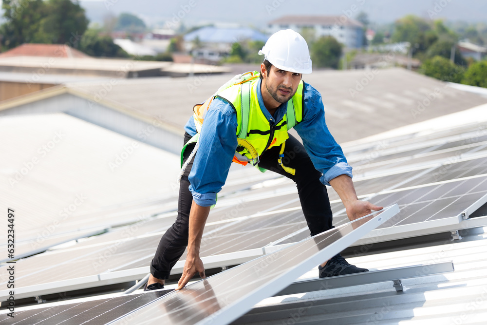 electrical engineering man Installing Solar Cell panels on Roof. Solar energy clean and green alternative energy concept. electrical engineering man Installing Solar Cell panels on Roof. Solar energy clean and green alternative energy concept.