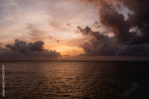 sunset sunrise over the sea with clouds