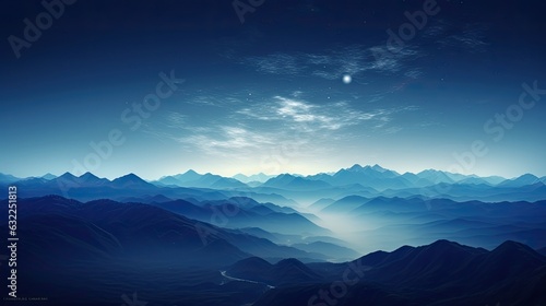 Moonlit mountains with misty silhouettes © HN Works