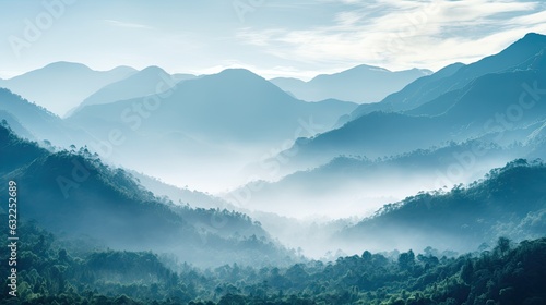 Morning mist over mountains in Kerala creating a stunningly serene nature scene © HN Works