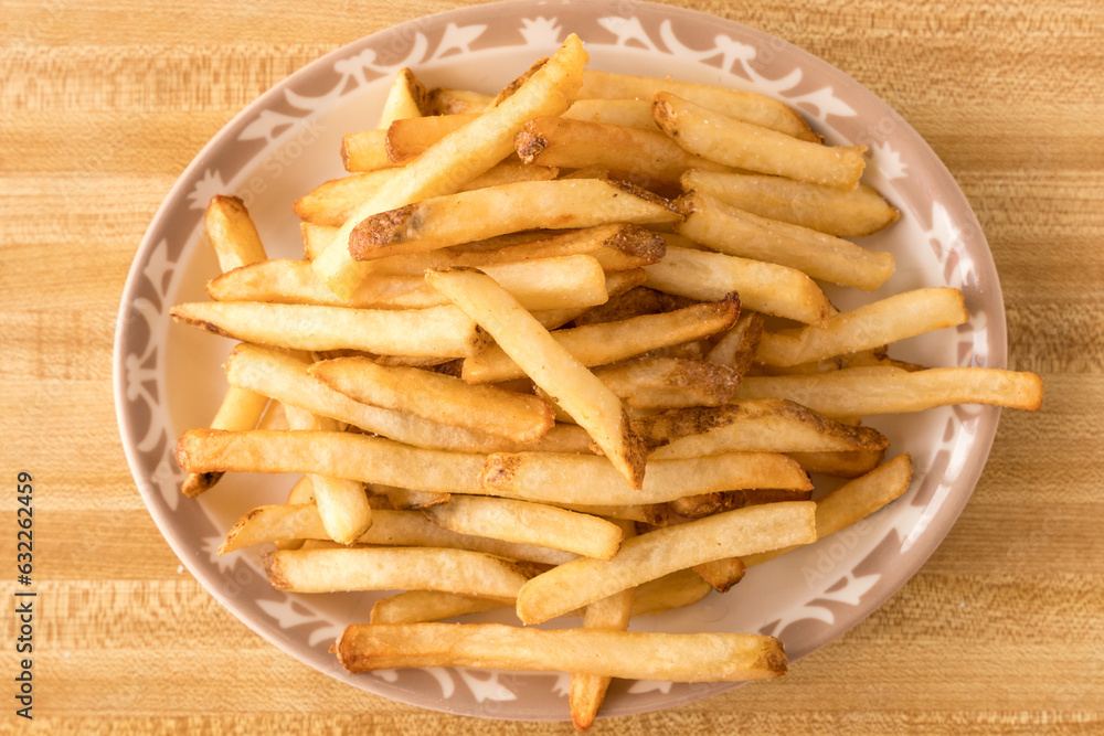 fresh cut french fries on a plate