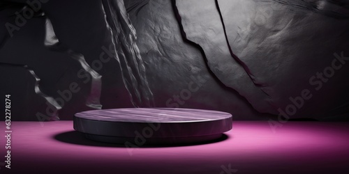 An empty black round podium on a stone table against the background of a black massif of stone. Modern background for product and merchandise. Stand/podium/table top for product display.