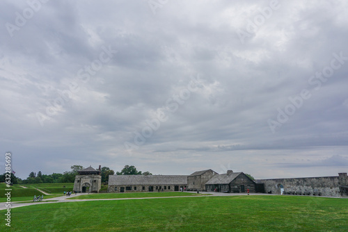 Porter, New York, USA: Visitors on the 23-acre grounds of the 18th-century Old Fort Niagara, on a cloudy day.