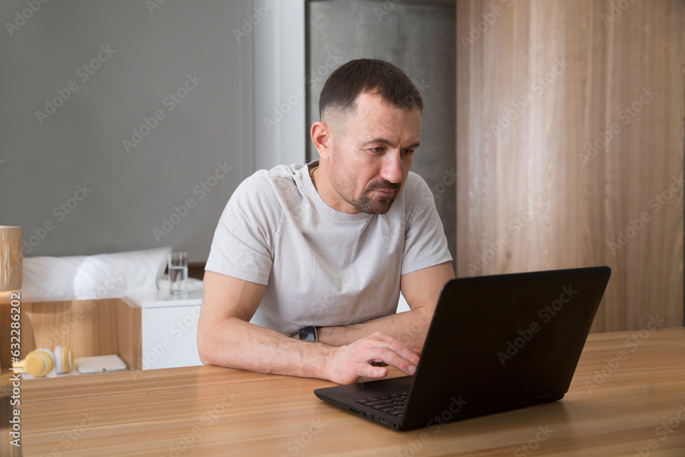 work from vacation home, remote workers. man using a laptop, connecting to the Internet at home. Working from Anywhere. work from vacation home, remote workers. man using a laptop, connecting to the Internet at home. Working from Anywhere.