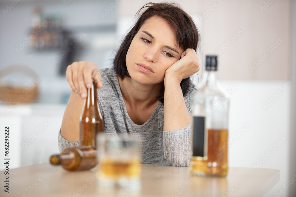 woman drinking wine at home concept of alcoholism woman drinking wine at home concept of alcoholism
