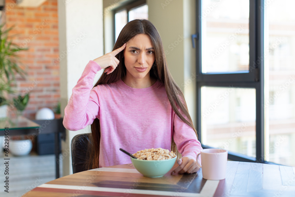 looking surprised, realizing a new thought, idea or concept. breakfast concept looking surprised, realizing a new thought, idea or concept. breakfast concept