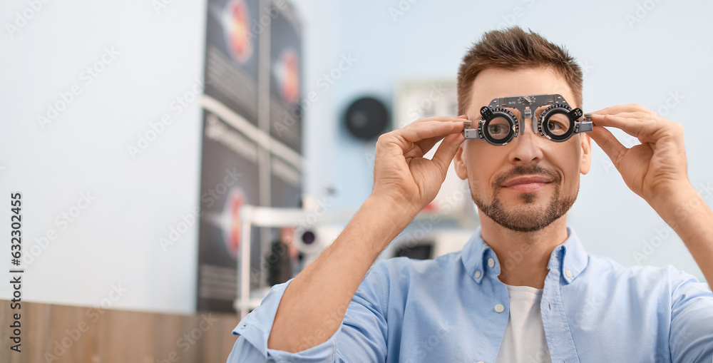 Man undergoing eye test in clinic Man undergoing eye test in clinic
