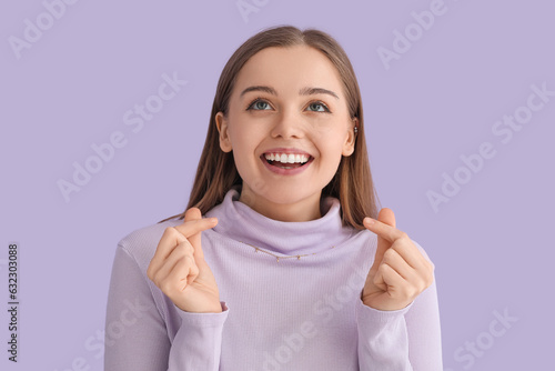 Young woman in sweater snap...