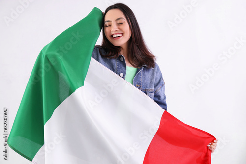 Young woman with flag of It...