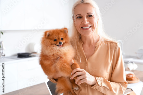 Mature woman with Pomerania...