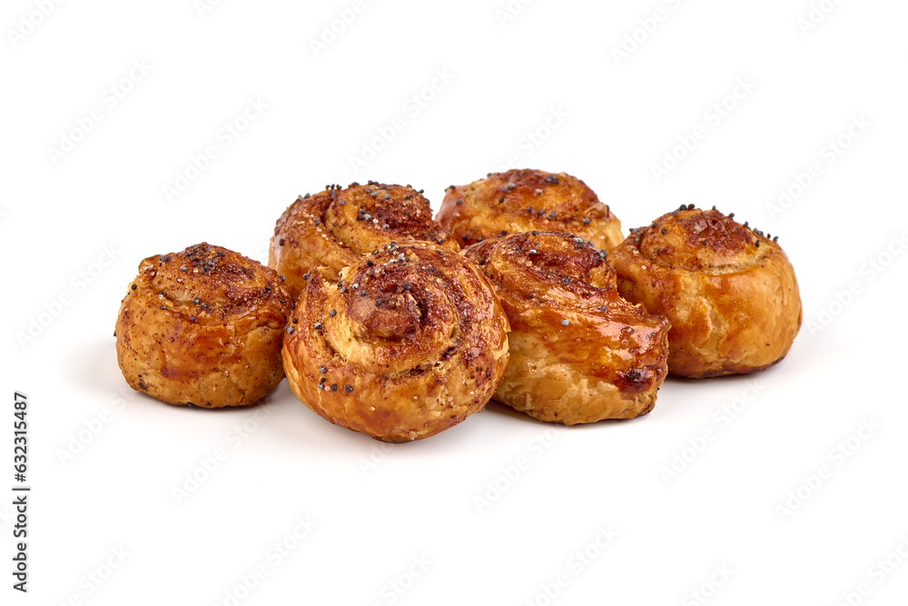 Sweet cinnamon rolls, close-up, isolated on white background.