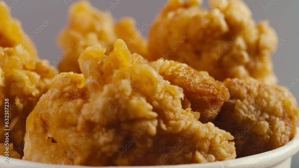 Fast food delivery meals chicken nuggets and fried chicken french fries, on wooden table ready to takeaway. Fat American cuisine. Fast food delivery meals chicken nuggets and fried chicken french fries, on wooden table ready to takeaway. Fat American cuisine.