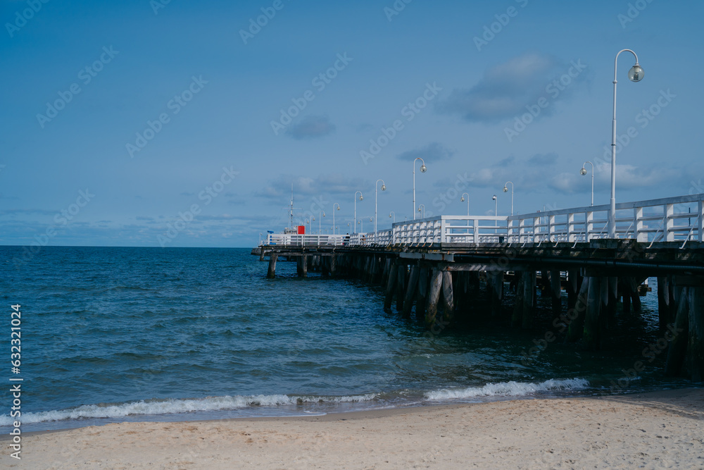 Molo w Sopocie is an Iconic Sopot pier, Polands longest wooden pier, providing breathtaking Baltic Sea views, leisure, and coastal charm. High quality photo