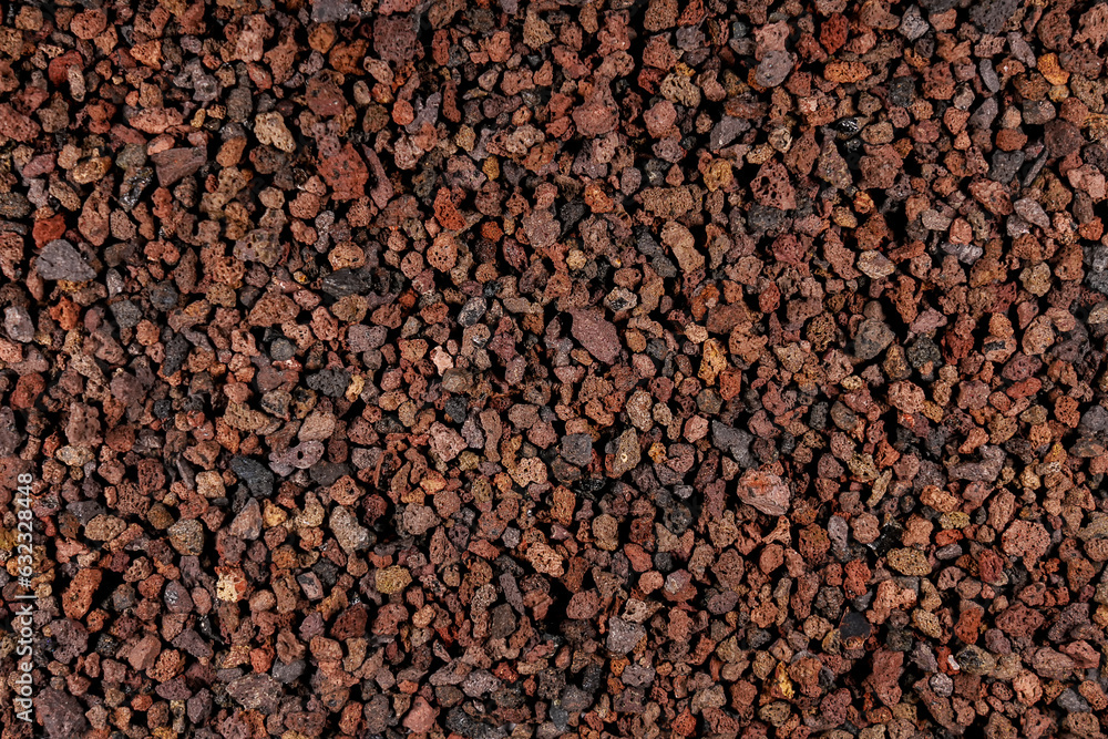 Natural aquarium lava gravel in red brown colors. Volcano lava mulch chippings mineral stones ground Natural aquarium lava gravel in red brown colors. Volcano lava mulch chippings mineral stones ground