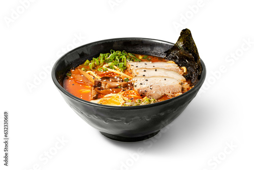 Spicy tonkotsu Ramen with pork in a bowl on white background.