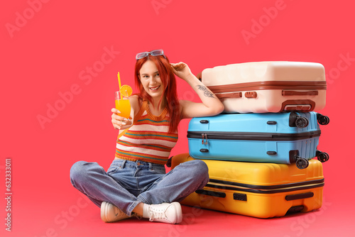 Female tourist with suitcas...