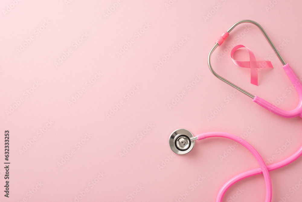 Plan your health check month. Top view flat lay composition with stethoscope and pink ribbon on soft pink surface, excellent for medical awareness messages Plan your health check month. Top view flat lay composition with stethoscope and pink ribbon on soft pink surface, excellent for medical awareness messages