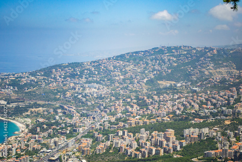 lebanon Jounieh Beirut cityscape coast landscape high up sky clouds mounatins mediterranean sea © kharzey