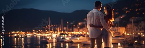 Fényképezés romantic couple in white clothers walk in harbor promenade,colorful blurred ligh