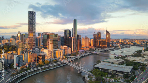 Aerial drone view of Brisbane City  QLD  Australia looking toward the west facing side of the city along Brisbane River and Riverside Expressway during late afternoon in August 2023    