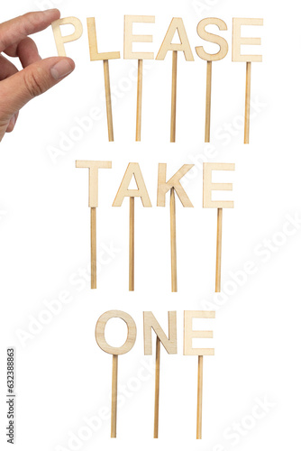 Text  Please Take One.A person making a wooden letter sign isolated on white background to give out candy on Halloween.