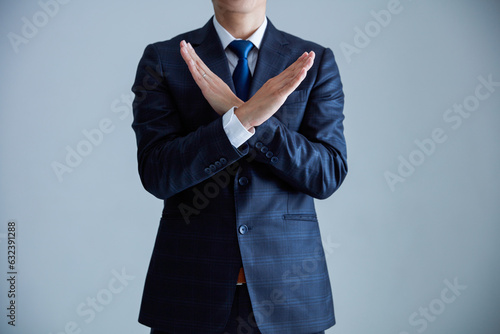 Obraz na plátne スーツを着てNGサインする男性　Business