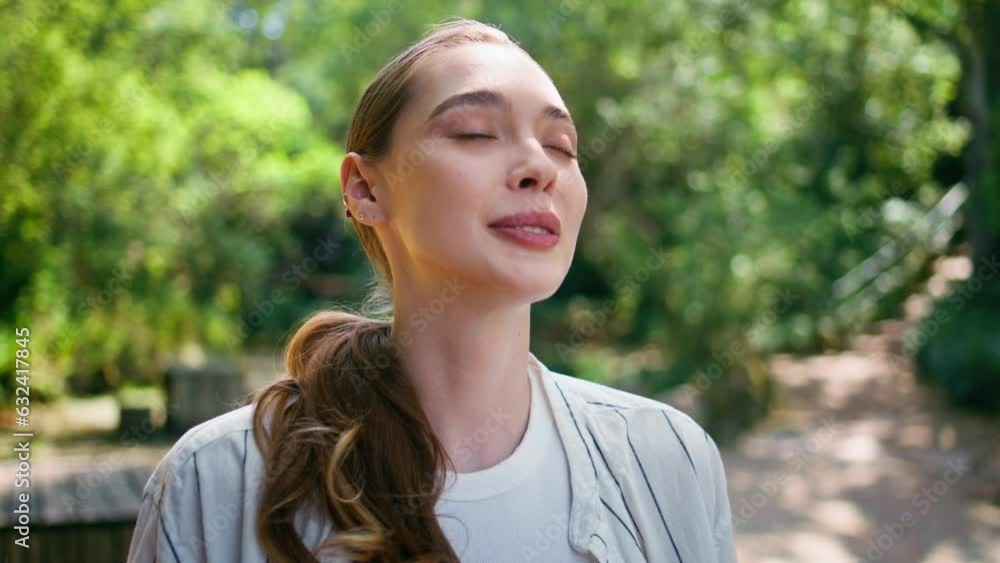 Portrait dreamy beautiful woman standing green forest. Gentle girl closing eyes Portrait dreamy beautiful woman standing green forest. Gentle girl closing eyes