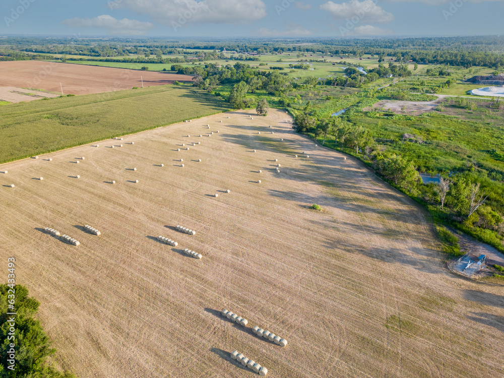 Aerial photo round hay bales Norman Oklahoma farmland landscape