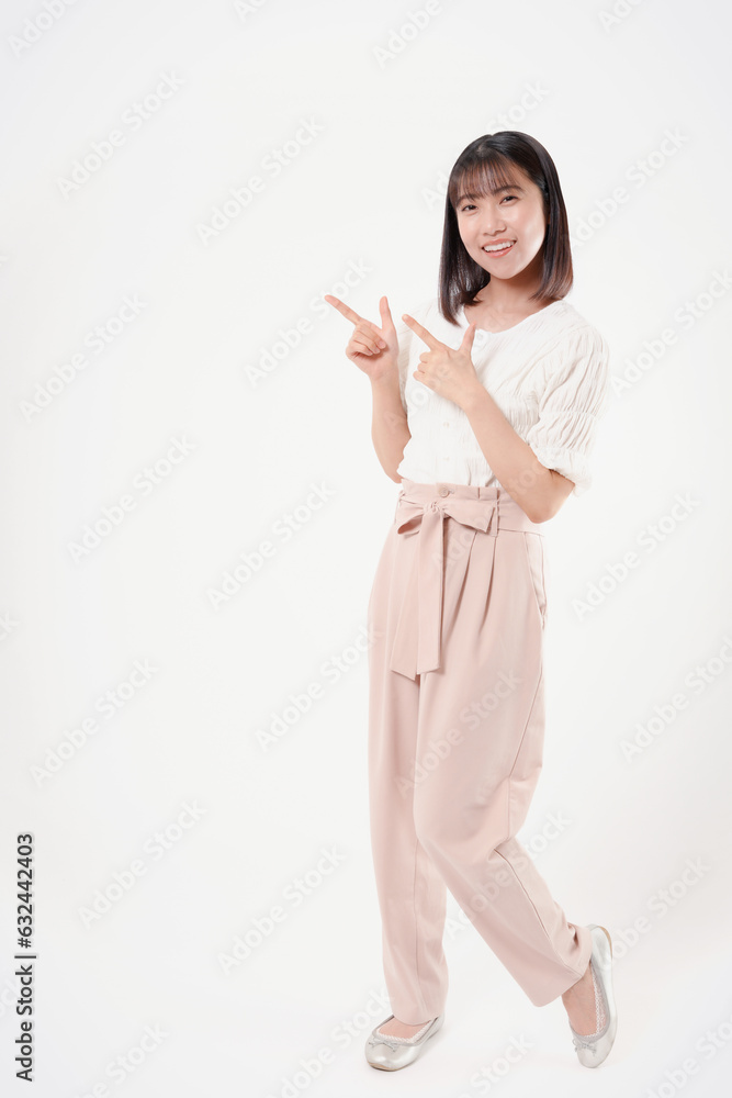 Fototapeta premium 左を指す女性