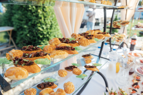 A large selection of food and different snacks in the oncoming zone of guests. A buffet for guests