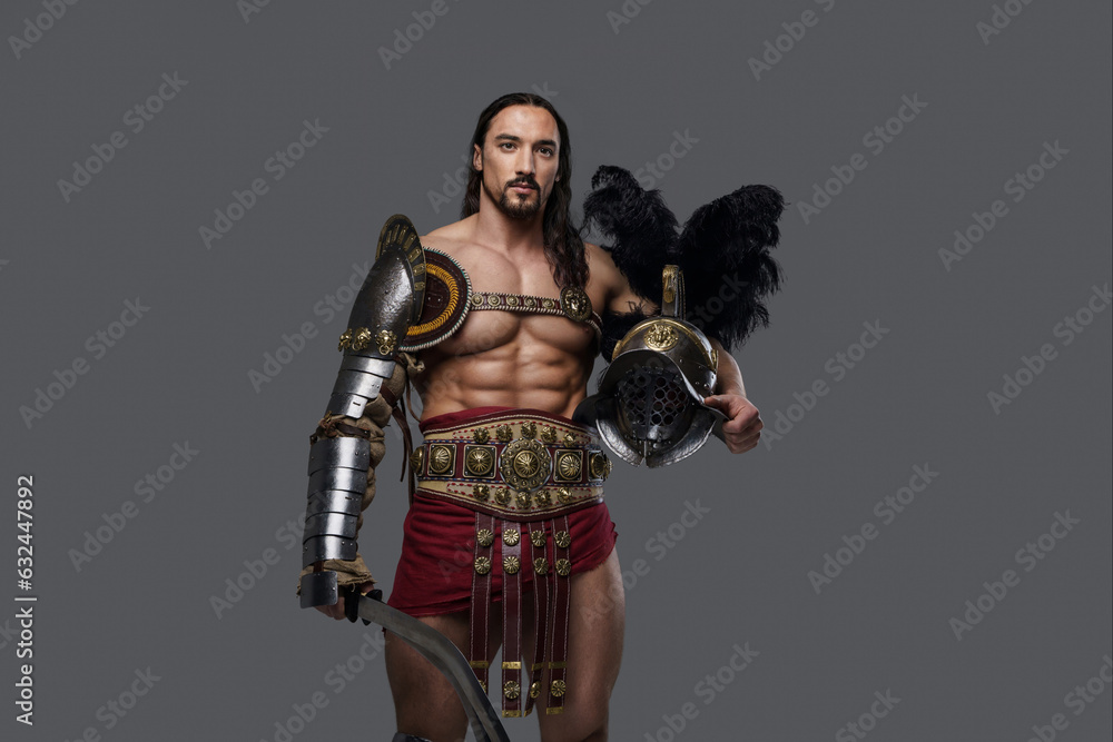 Powerful and attractive gladiator with a stylish beard and luscious ...