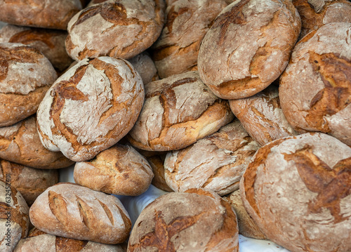 Heap of wholemeal breads in market