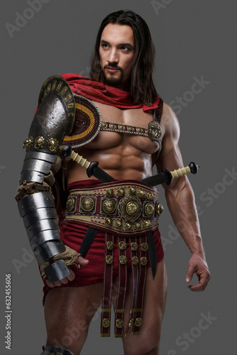 Majestic gladiator in sleek light armor and red cloak against a gray background