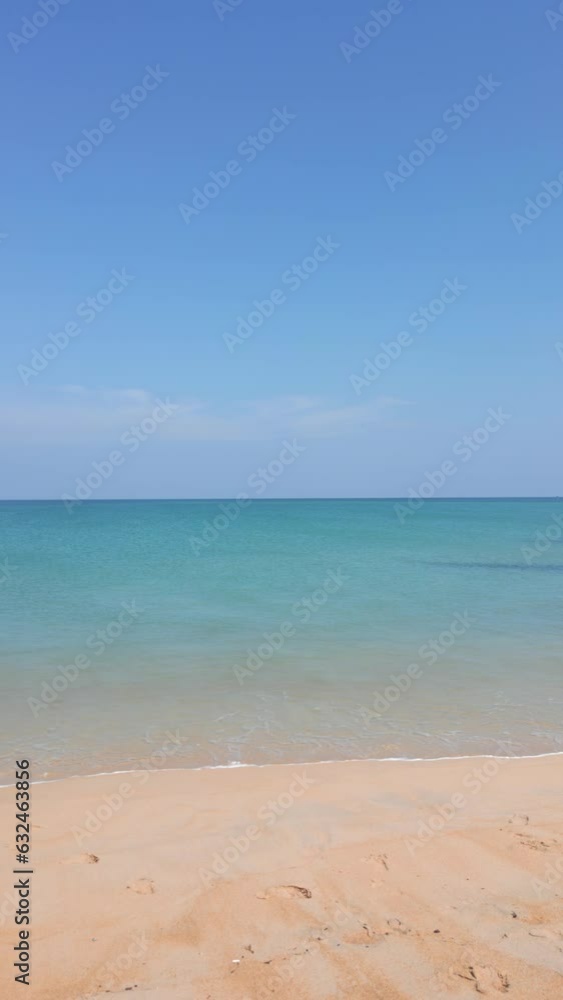 The airplane landing over a beautiful tropical beach and turquoise water in Phuket, Thailand. The plane landing at the resort. The airplane landing over a beautiful tropical beach and turquoise water in Phuket, Thailand. The plane landing at the resort.