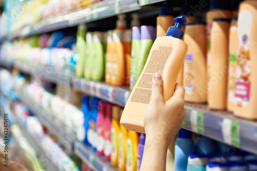 Plastic bottle of shampoo in store