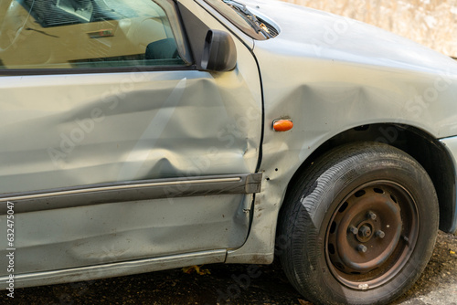 Wallpaper Mural Big dent in the car door Torontodigital.ca