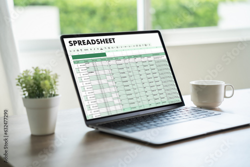 businessman working with data and graphs in spreadsheet documents for online analysis Microsoft Excel project dashboard accounting digital