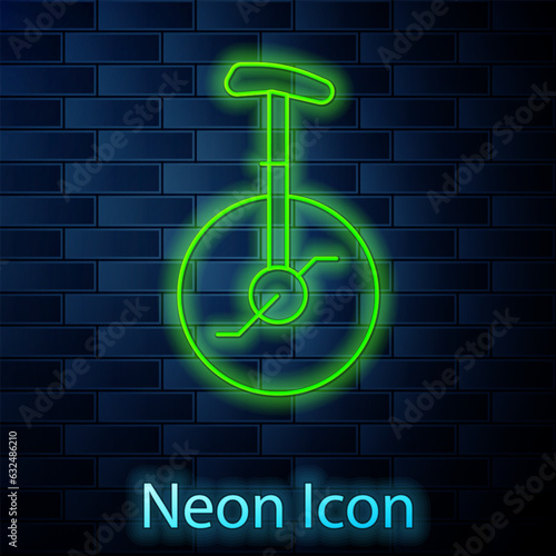 Glowing neon line Unicycle or one wheel bicycle icon isolated on brick wall background. Monowheel bicycle. Vector