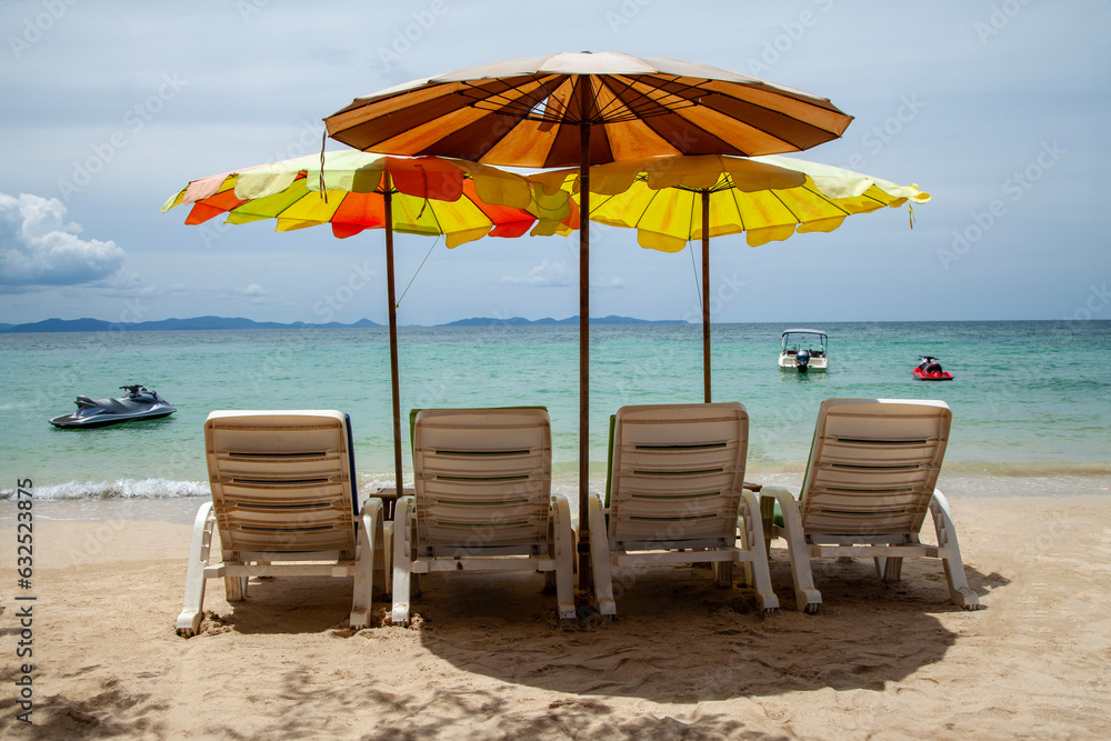 beach chairs and umbrella on the beach