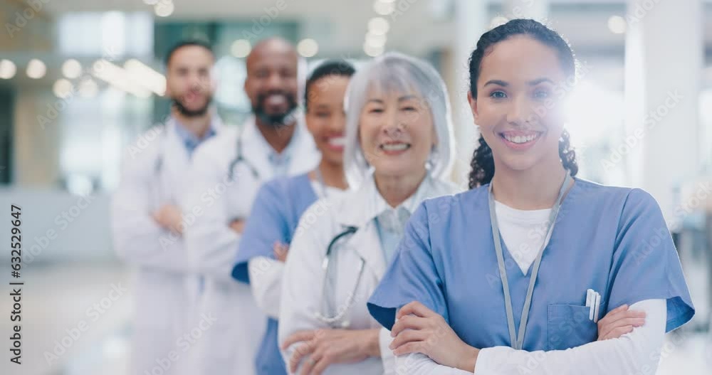 Crossed arms, success and face of group of doctors standing in the medical hospital with confidence. Happy, professional and portrait of team of healthcare workers in hallway of a medicare clinic. Crossed arms, success and face of group of doctors standing in the medical hospital with confidence. Happy, professional and portrait of team of healthcare workers in hallway of a medicare clinic.
