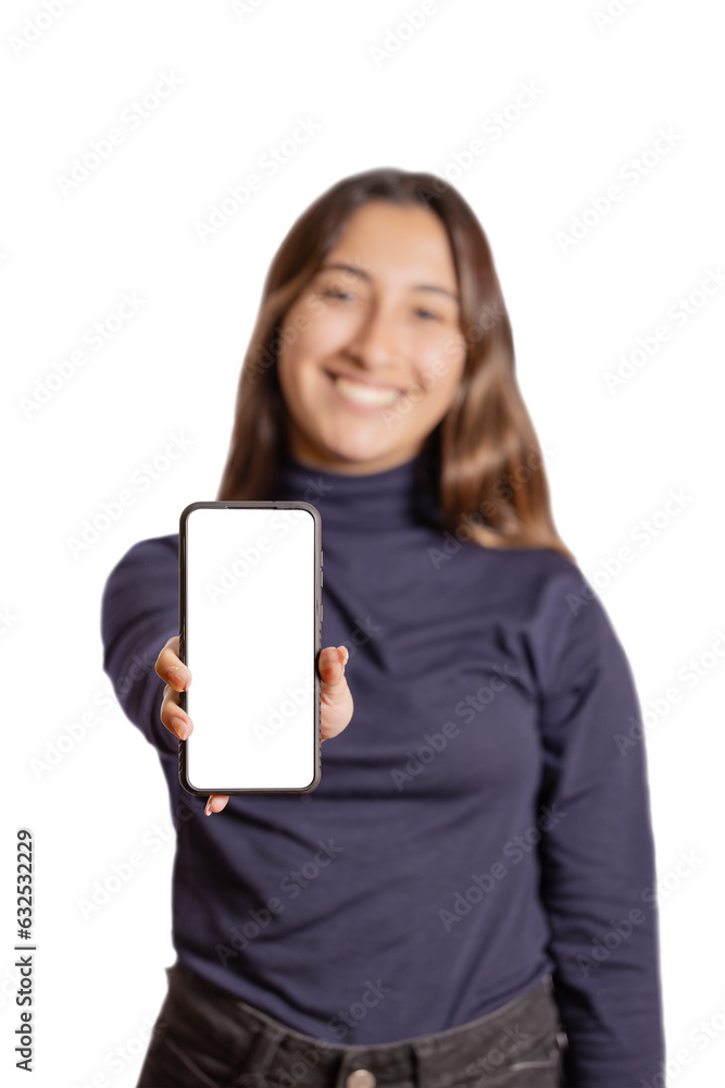 Latin girl out of focus shows the blank screen of her mobile phone isolated on white background. Latin girl out of focus shows the blank screen of her mobile phone isolated on white background.