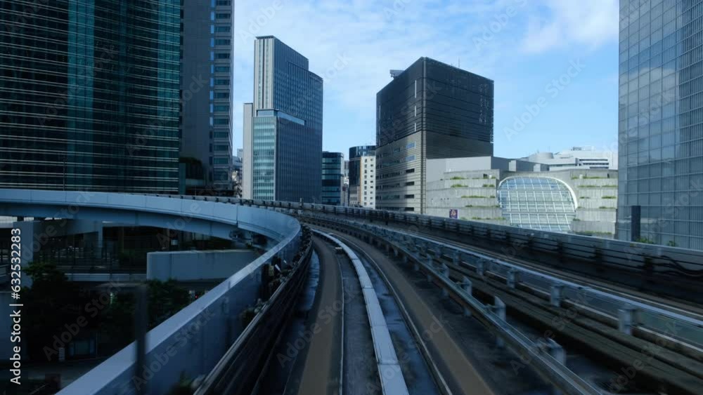 Automated train moving forward on the Yurikamome line in Tokyo Japan. Automated train moving forward on the Yurikamome line in Tokyo Japan.