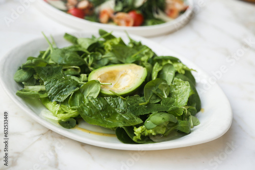 Healthy leaf salad with avocado