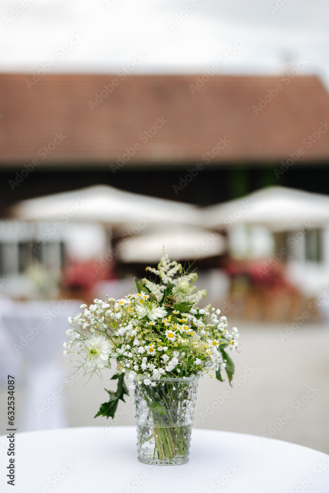 Beautiful flower decoration on a table at a wedding reception Beautiful flower decoration on a table at a wedding reception