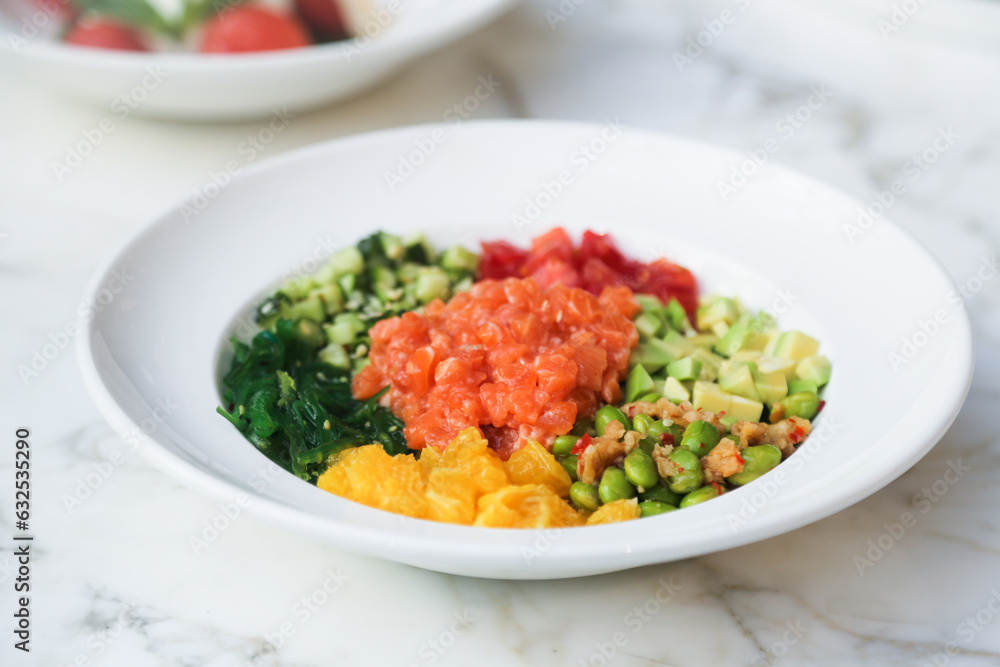 Traditional salmon poke with fresh orange Traditional salmon poke with fresh orange