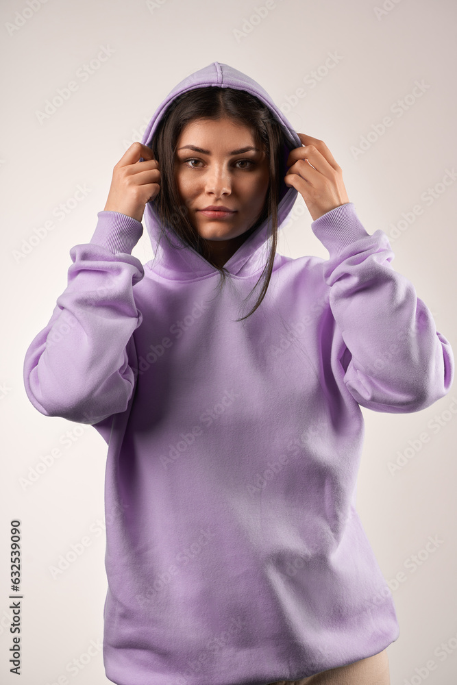 woman wears a plain hoodie. Clothes mockup for logo and branding woman wears a plain hoodie. Clothes mockup for logo and branding