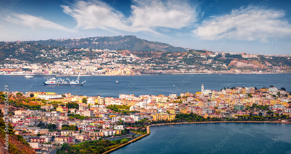 Picturesque summer cityscape of Bacoli town and Miseno lake, Italy, Europe. Adorable  morning seascape of Mediterranean sea. Traveling concept background.