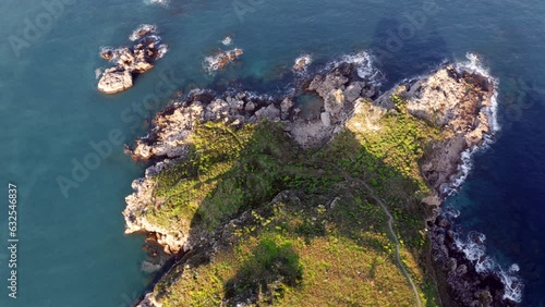 4k drone top view flight over (Ultra High Definition) of popular tourust destination - Pool Of Venus. Picturesque spring scene of Milazzo peninsula, Sicily, Italy. Beauty of nature concept background. photo